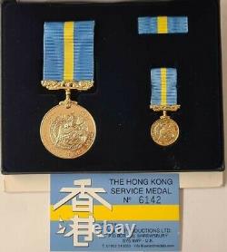 A boxed Hong Kong Service medal to Pte. A. I. P. Dockerill of Royal Norfolk Rgt