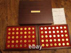 Danbury Mint OUR ROYAL SOVEREIGNS 70 coin with wood box. 925 silver with22kt gold