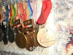 Japanese Imperial Medal bar 7 medals. Manchukuo 1940 Census medal Extremely RARE