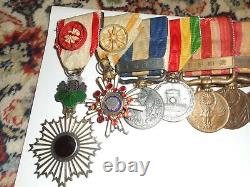 Japanese Imperial medal bar 9 place. Rising sun 5th class etc