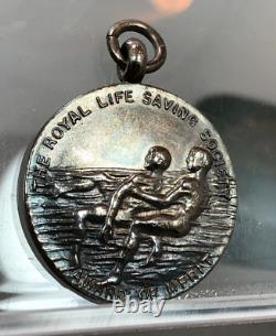Royal Life Saving Society Award of Merit Sterling Silver Medal RR Thomson 1929